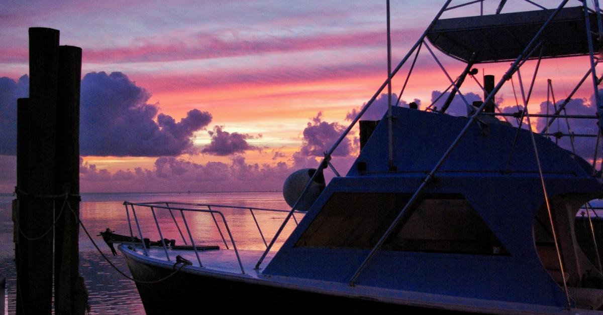 Photo of a boat in the sunset